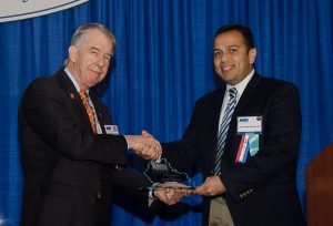 2015-16 KMA President Ted Miller, M.D., PhD, presented Sen. Ralph Alvarado, M.D., of Winchester with the KMA Community Service Award during the Kentucky Physicians Leadership Academy at the KMA Annual Meeting Saturday. Photo by Mary Branham for KMA.