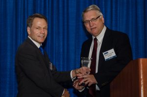 2015-16 KMA President Ted Miller, M.D., PhD, presented Sheldon Bond, M.D., FACS, of Louisville with the KMA Educational Achievement Award during the Kentucky Physicians Leadership Academy at the KMA Annual Meeting Saturday. Photo by Mary Branham for KMA.